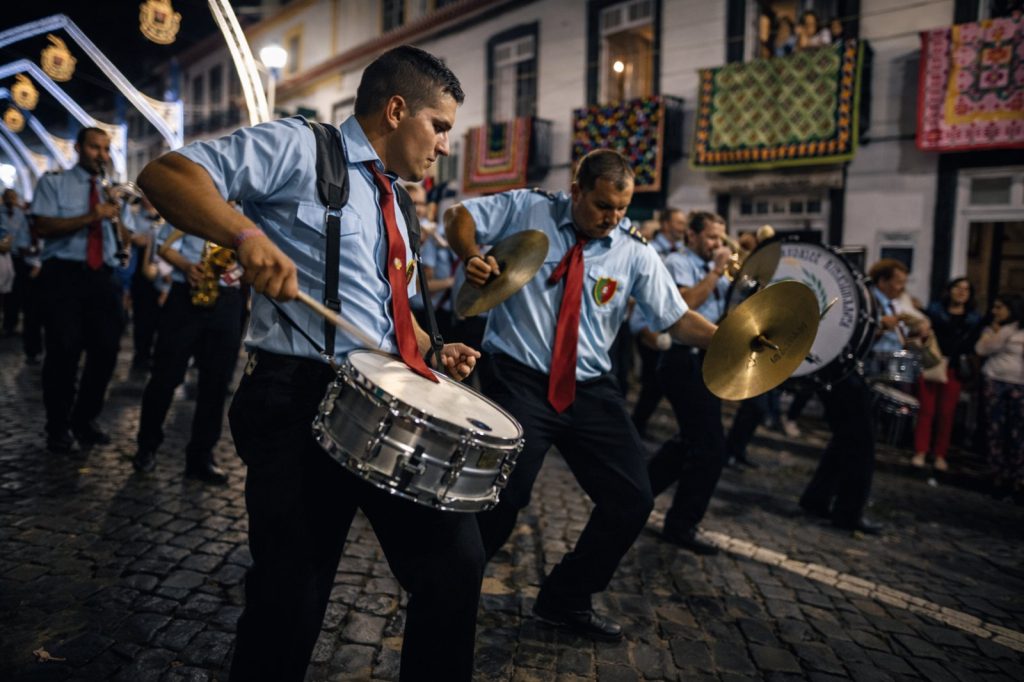 Marching band performing at night during Sãojoaninas festival in Angra do Heroísmo, Terceira Island